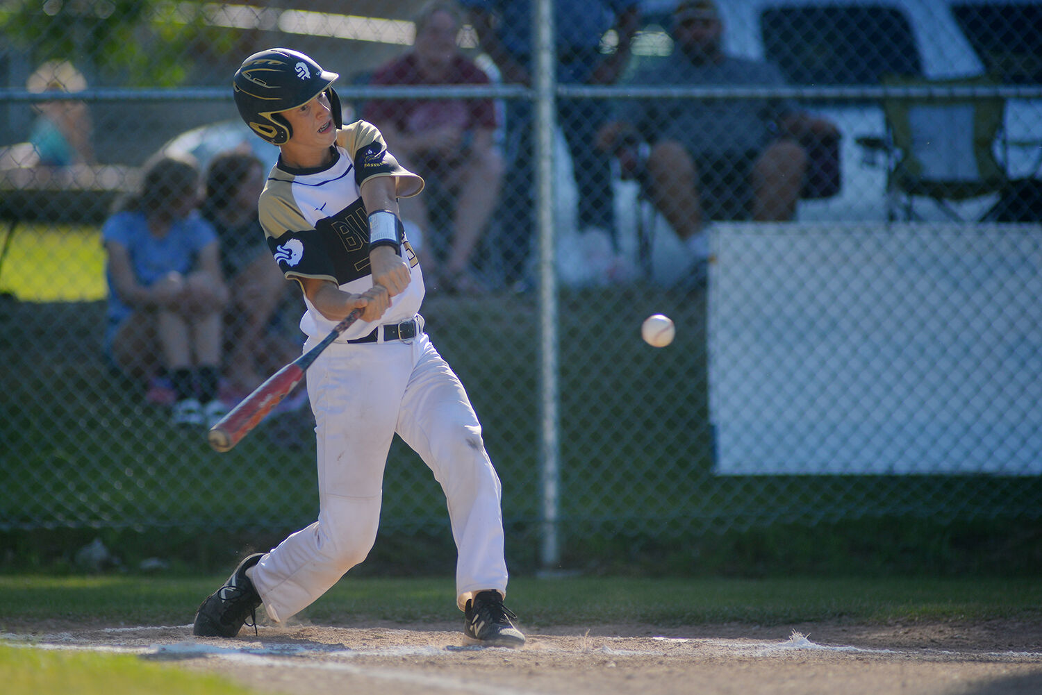 Cohen Gossard swings and connects with a pitch
